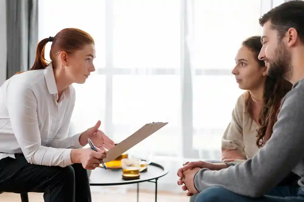 Compassionate provider listening to a patient during an initial mental health consultation.
