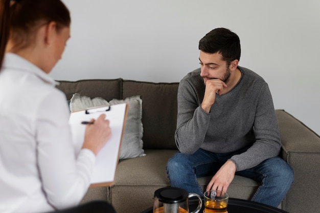 A person reflecting on the disconnection and mental drain often felt with depression.